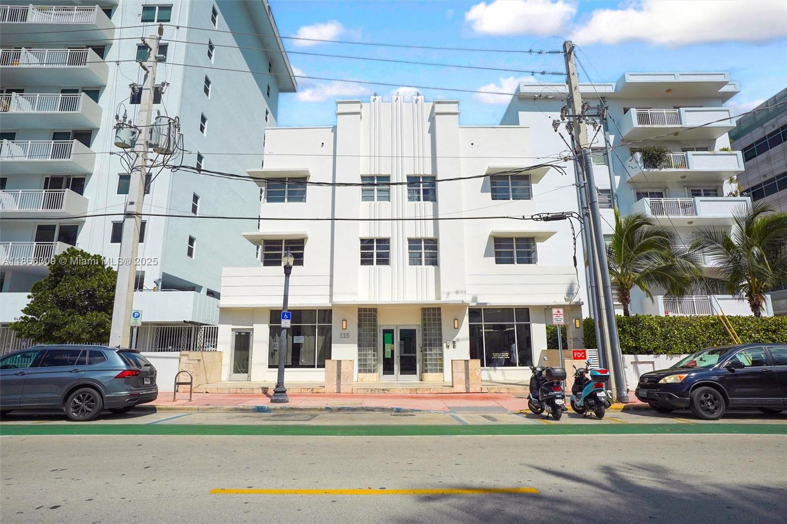 335 Ocean Drive, Unit 223 Miami Beach, FL 33139 - Photo 2 of 15 a front view of a building with street view