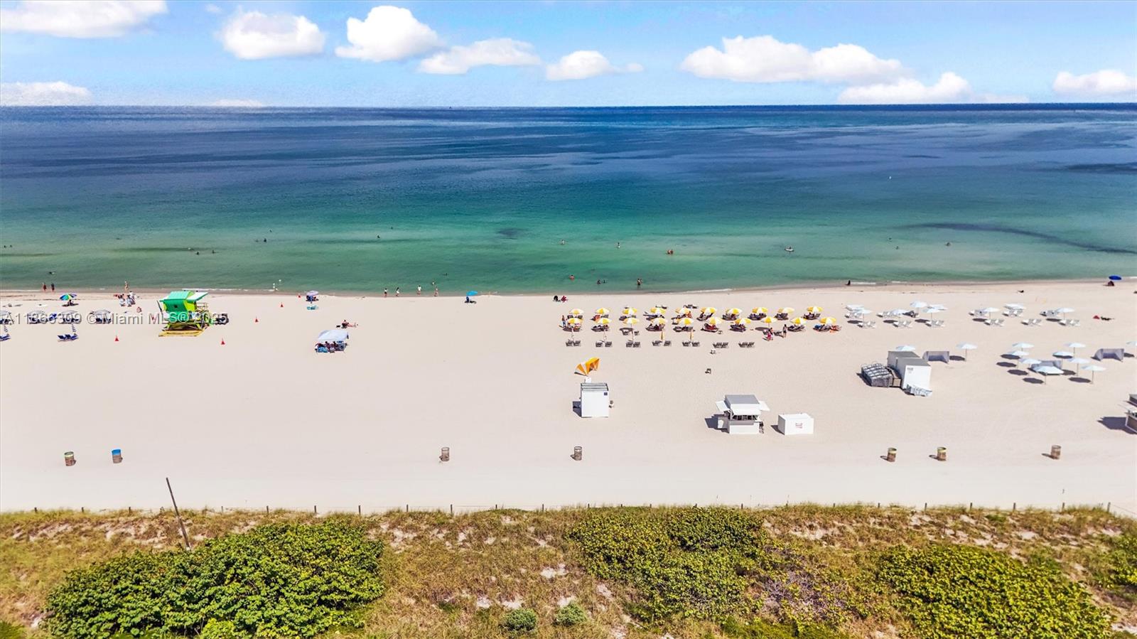 335 Ocean Drive, Unit 223 Miami Beach, FL 33139 - Photo 9 of 15 a view of cabinets with wooden floor