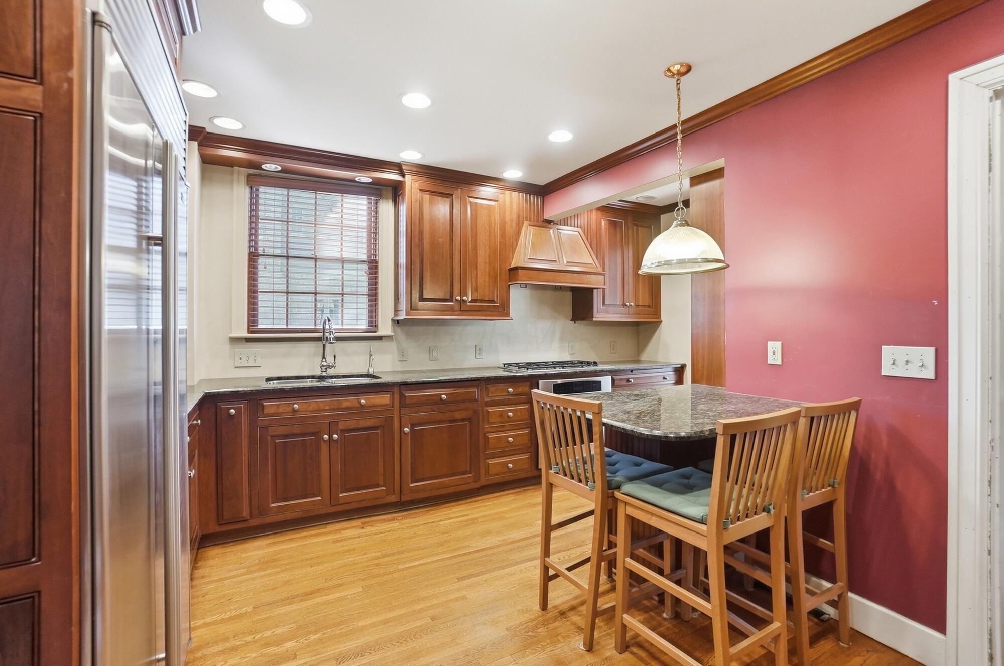 1627 Doone Road Upper Arlington, OH 43221 - Photo 18 of 37 Beautiful Amish made cabinets with granite countertops.