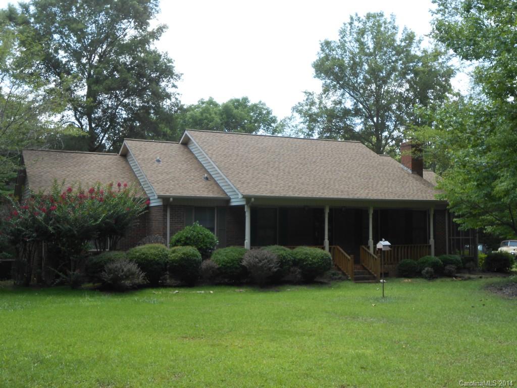 1347 Lee Ormand Road Lancaster, SC 29720 - Photo 1 of 18 a front view of a house with garden