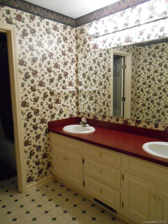 1347 Lee Ormand Road Lancaster, SC 29720 - Photo 14 of 18 a bathroom with a sink and a mirror
