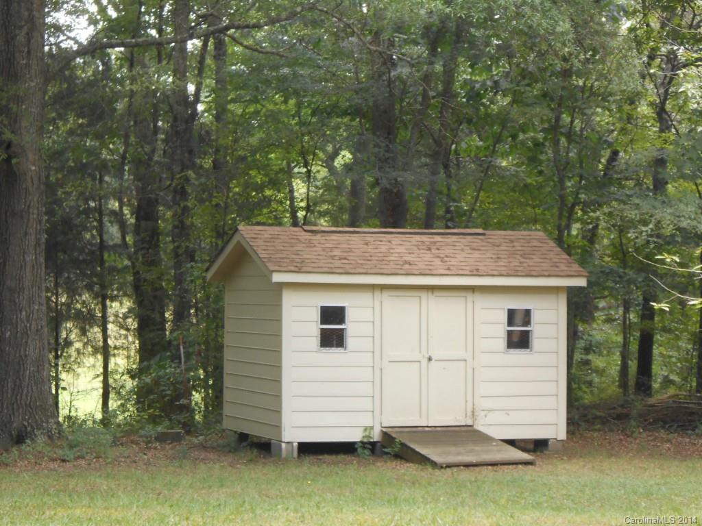 1347 Lee Ormand Road Lancaster, SC 29720 - Photo 4 of 18 a view of a house with a backyard