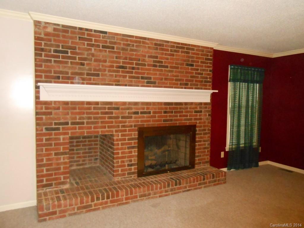 1347 Lee Ormand Road Lancaster, SC 29720 - Photo 8 of 18 a view of empty room with a fireplace