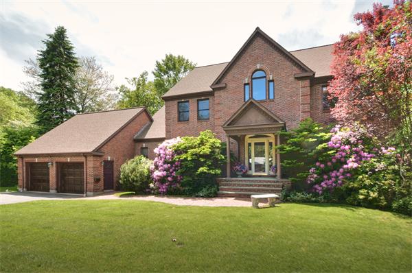 108 Kendall Road Lexington, MA 02421 - Photo 1 of 1 a front view of a house with a garden