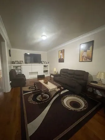 a kitchen with a stove and a refrigerator