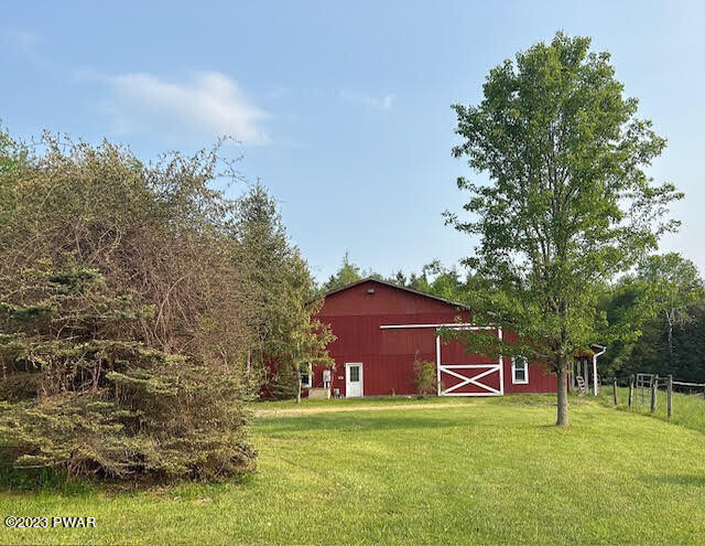 382 Roemerville Road Newfoundland, PA 18445 - Photo 23 of 25 a fire hydrant in the middle of a field