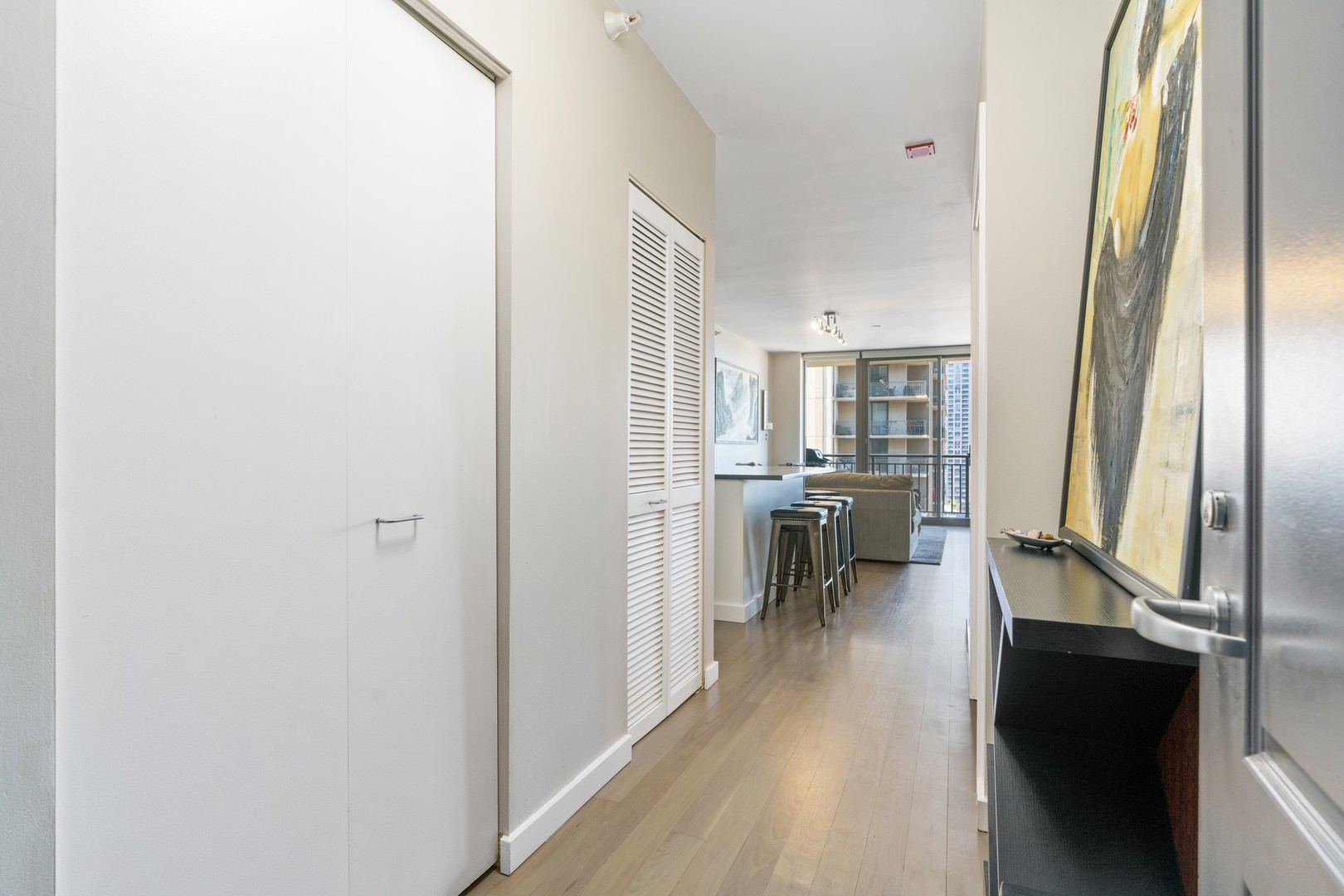 630 North State Street, Unit 2210 Chicago, IL 60654 - Photo 15 of 23 a view of a living room with a fireplace