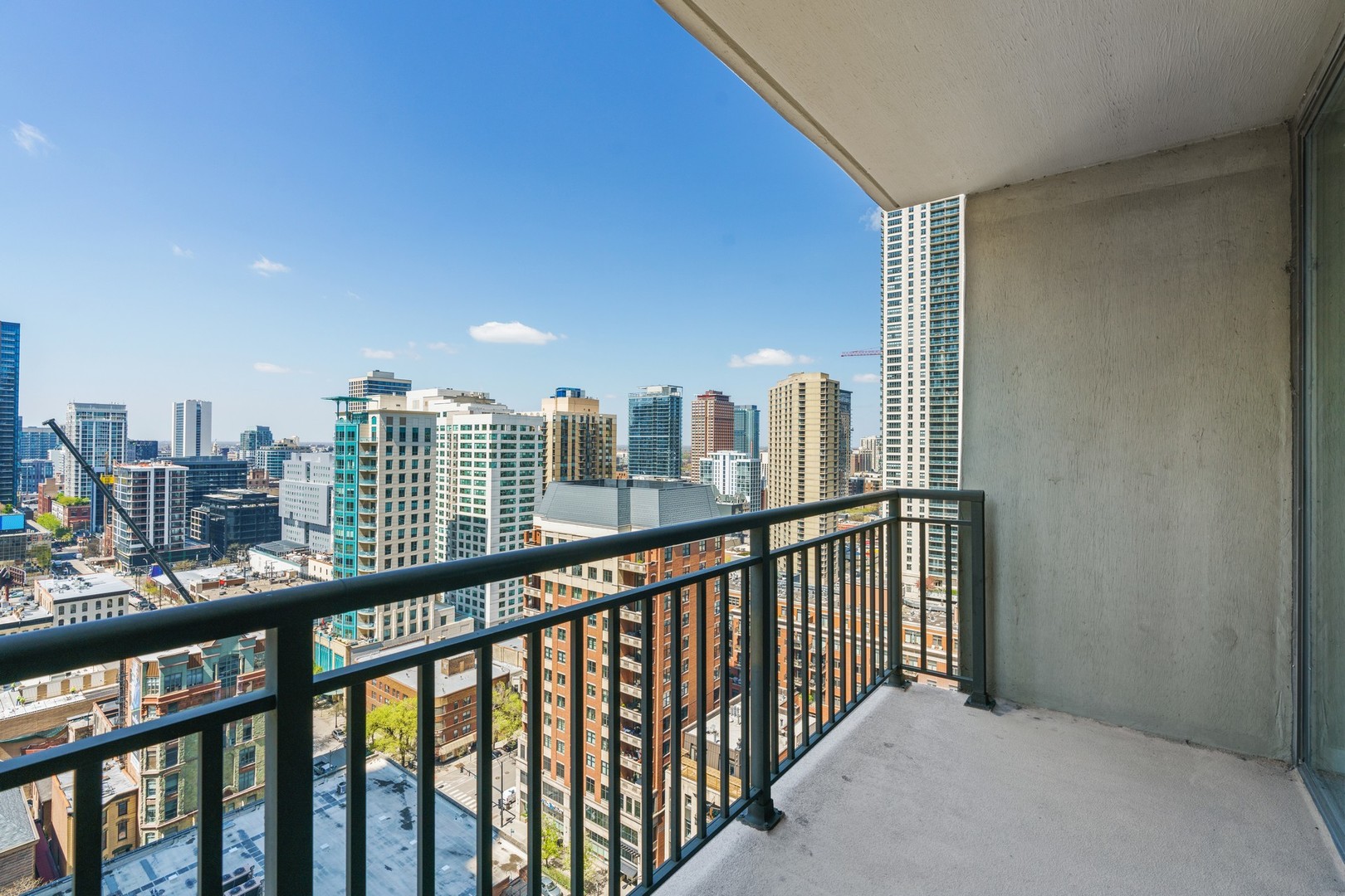 630 North State Street, Unit 2210 Chicago, IL 60654 - Photo 16 of 23 a view of city from a balcony