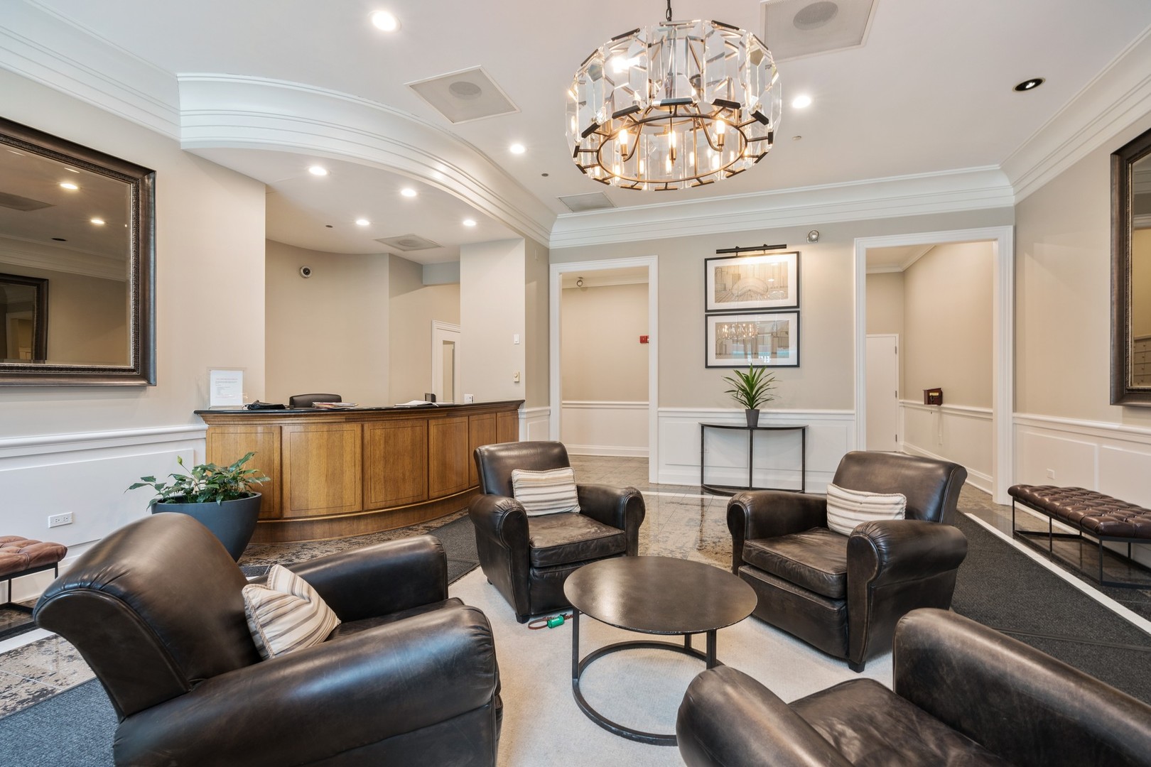 630 North State Street, Unit 2210 Chicago, IL 60654 - Photo 18 of 23 a living room with furniture and a chandelier
