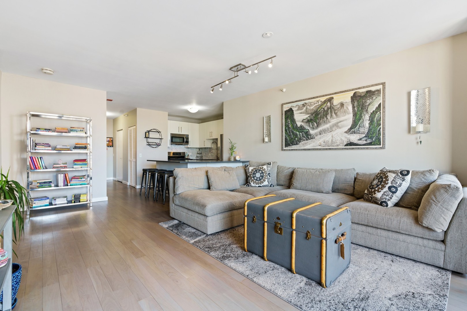 630 North State Street, Unit 2210 Chicago, IL 60654 - Photo 4 of 23 a living room with furniture and view of kitchen