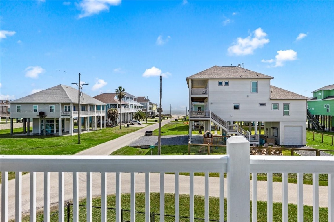 839 Eastview Crystal Beach, TX 77650 - Photo 5 of 44 a front view of a house with a yard