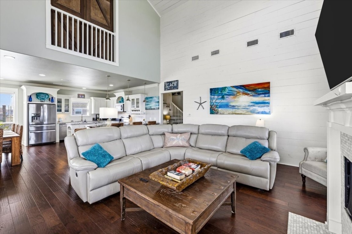 839 Eastview Crystal Beach, TX 77650 - Photo 10 of 44 a living room with furniture and a flat screen tv
