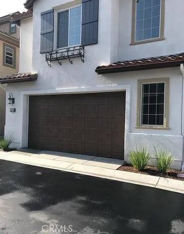 a view of a house with a garage