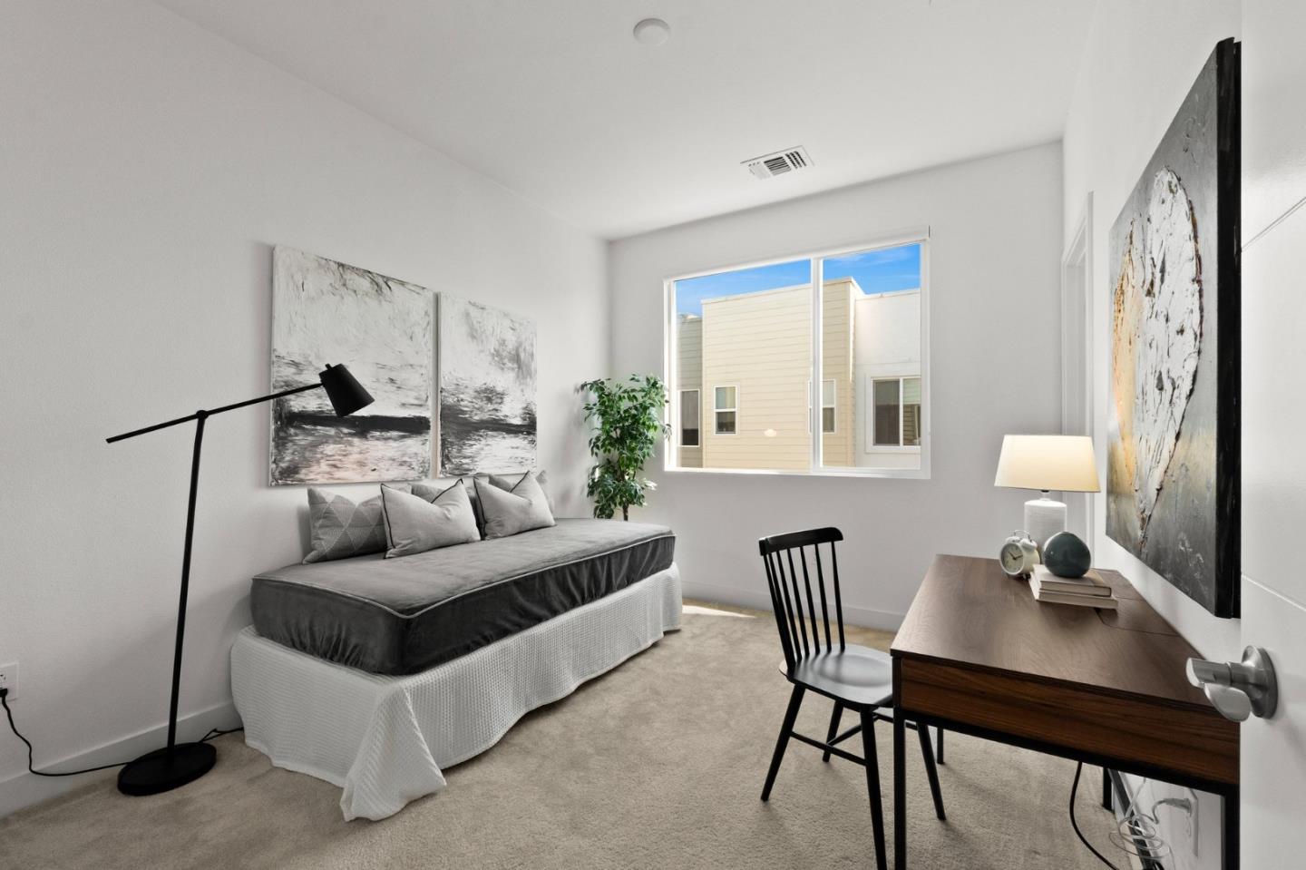 117 Uptown Circle Oakland, CA 94607 - Photo 17 of 25 a living room with furniture and a large window