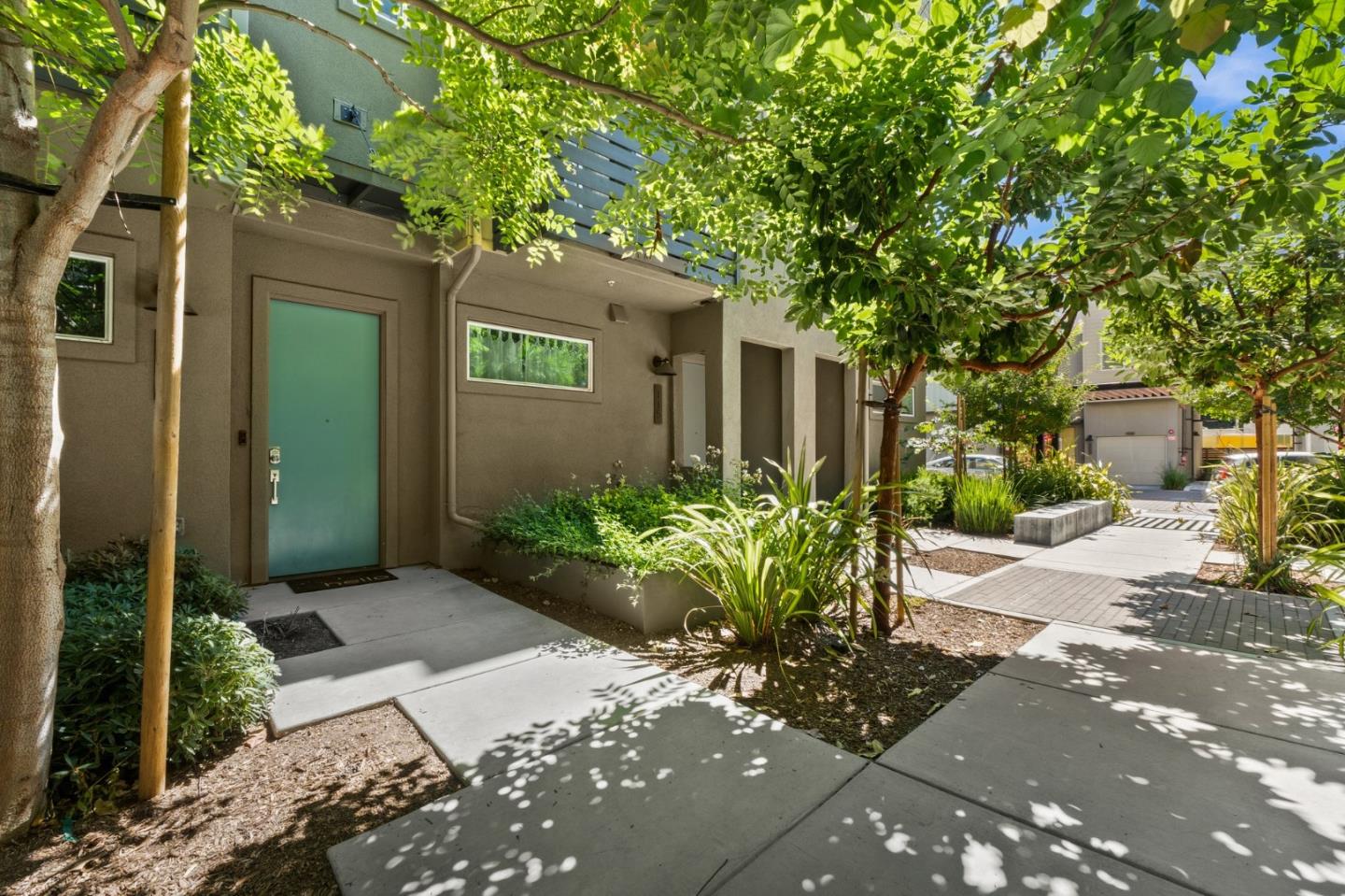 117 Uptown Circle Oakland, CA 94607 - Photo 2 of 25 a front view of a house with a yard