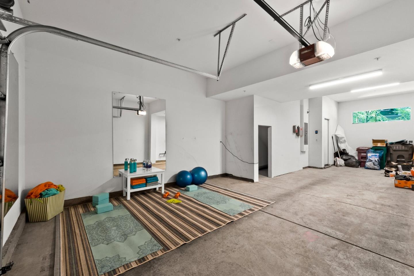 117 Uptown Circle Oakland, CA 94607 - Photo 21 of 25 a view of a room with gym equipment