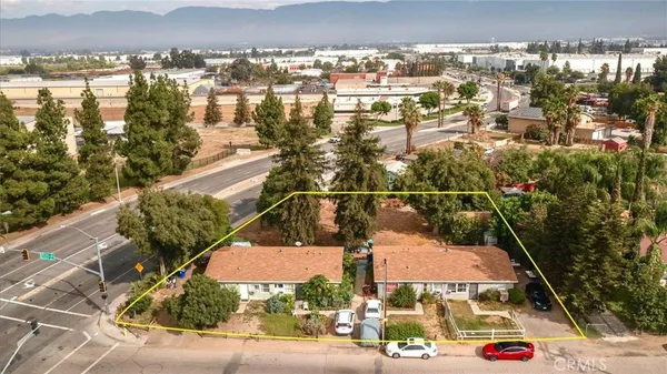 an aerial view of residential building and sign board
