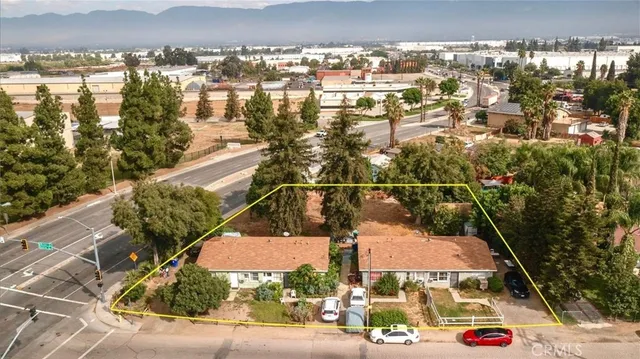 an aerial view of residential building and sign board