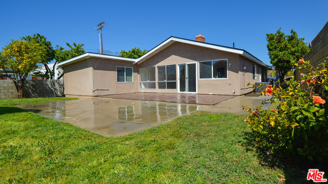 1238 Sultan Circle Carson, CA 90746 - Photo 16 of 18 a front view of a house with a yard