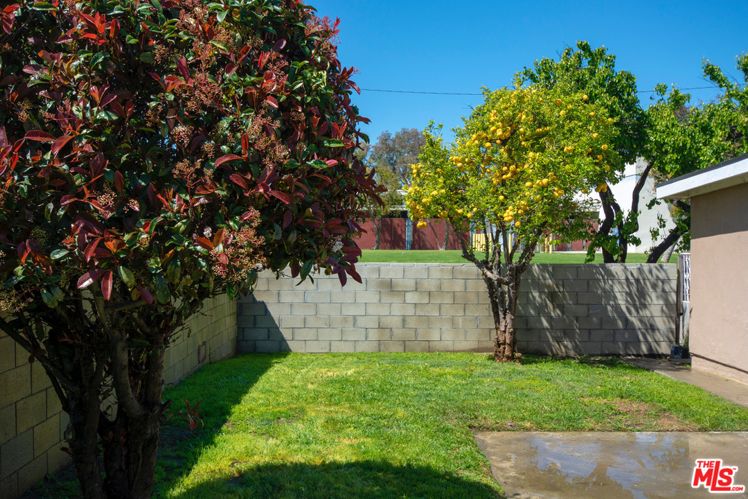 1238 Sultan Circle Carson, CA 90746 - Photo 17 of 18 a view of a backyard with large trees