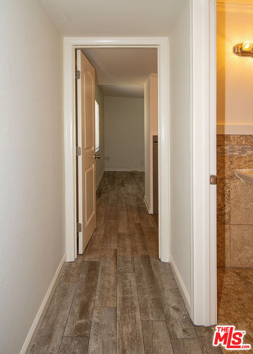 1238 Sultan Circle Carson, CA 90746 - Photo 5 of 18 a view of a bathroom from a hallway