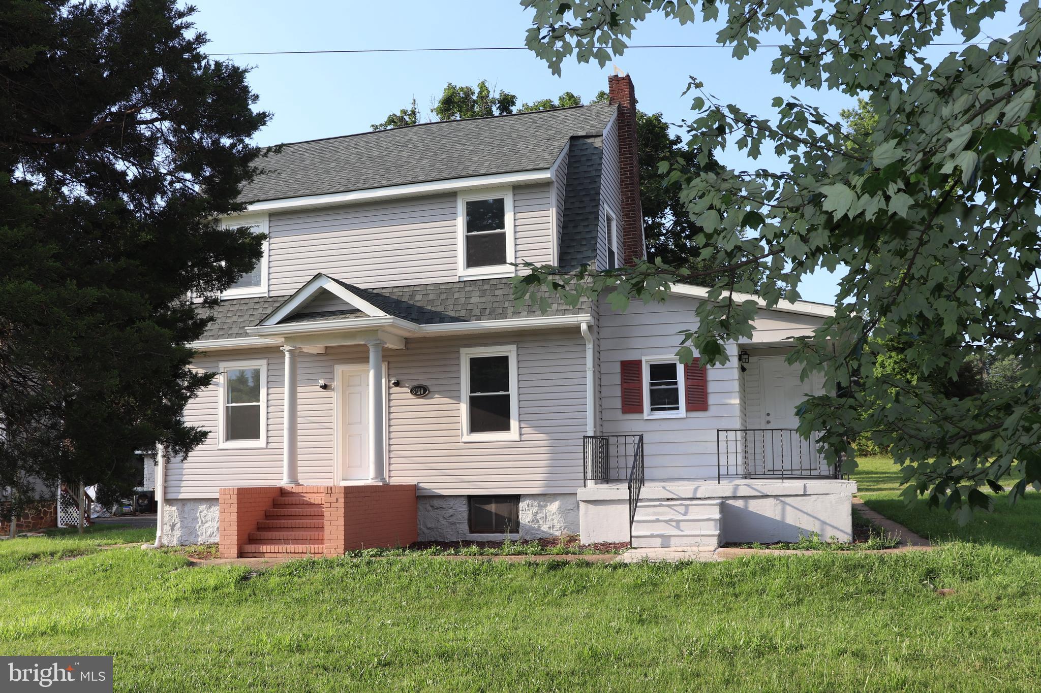 8400 Liberty Road Baltimore, MD 21244 - Photo 29 of 32 a front view of house with yard and green space