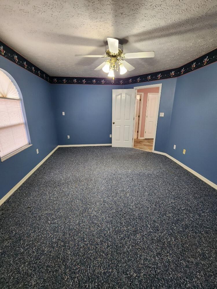 1177 Lisa Lane Okeechobee, FL 34974 - Photo 12 of 22 a view of an empty room with a window