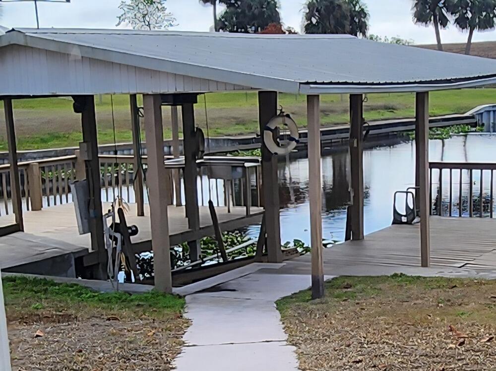 1177 Lisa Lane Okeechobee, FL 34974 - Photo 21 of 22 a view of a house with a porch