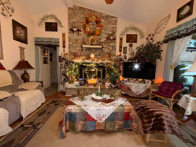 a bed room with a bed and a television