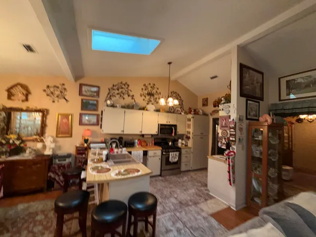 a view of a dining room with furniture