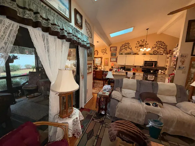 a view of living room with furniture and rug