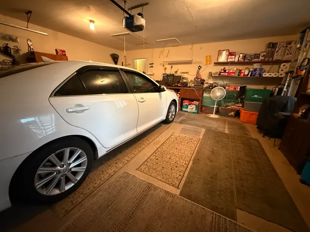 a utility room with lots of car parked