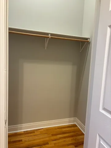 a view of a room with racks on the wall