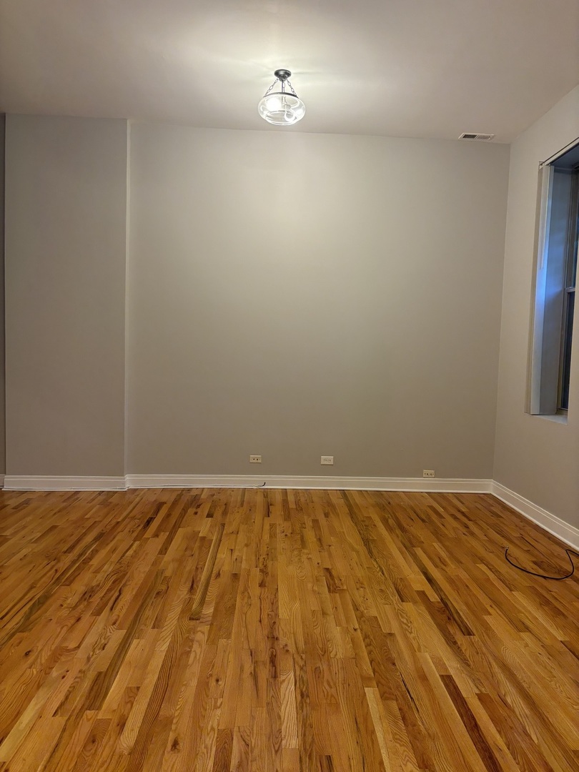 2002 West Chicago Avenue, Unit 2R Chicago, IL 60622 - Photo 8 of 17 wooden floor in a room