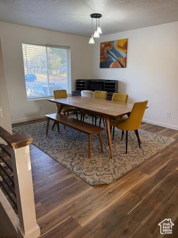 175 North 160 East Hurricane, UT 84737 - Photo 14 of 43 Dining space with a textured ceiling and dark wood finished floors
