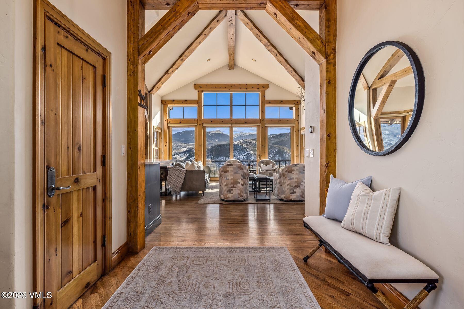 62 Elk Run Edwards, CO 81632 - Photo 14 of 43 a living room with furniture a fireplace and a large window