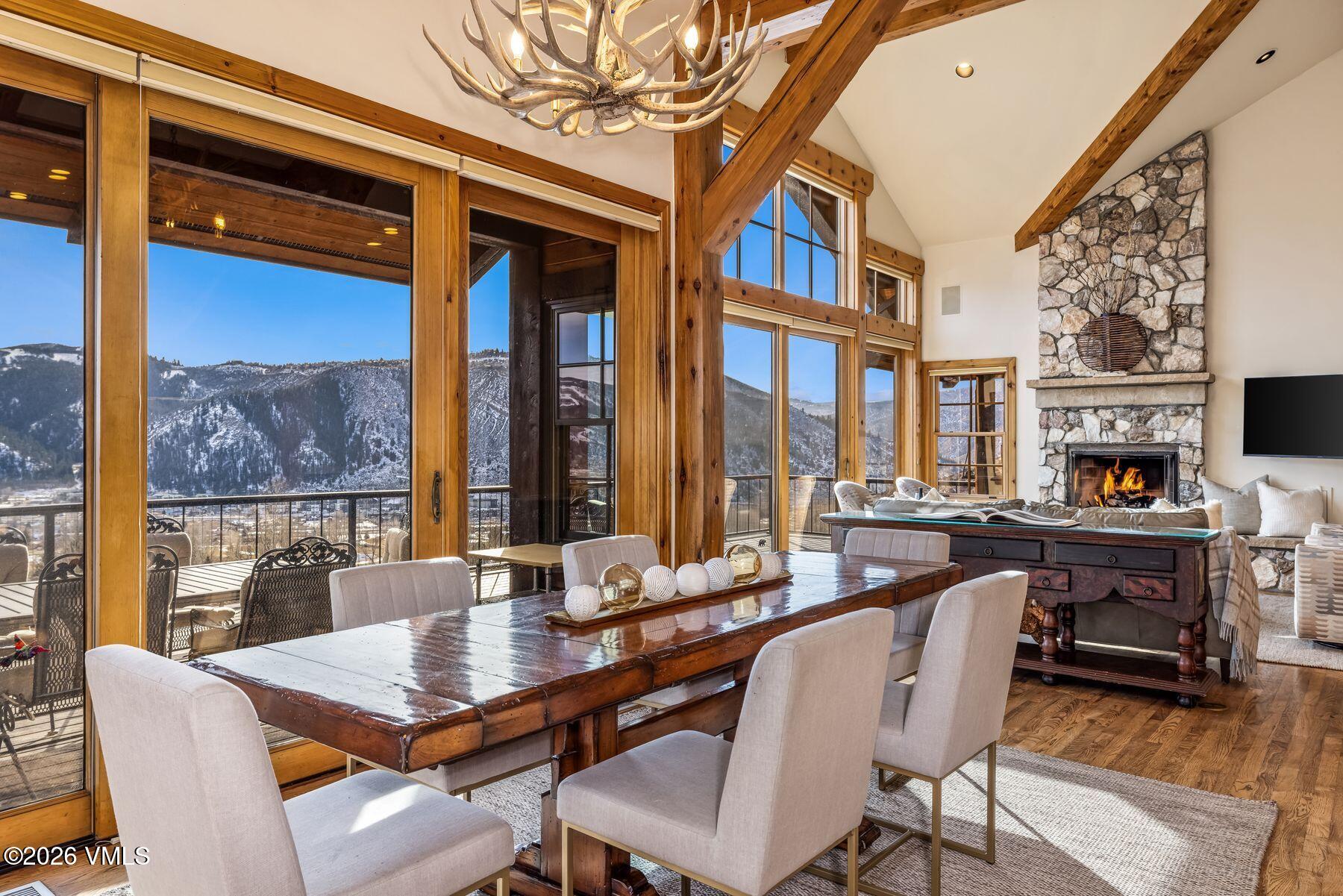 62 Elk Run Edwards, CO 81632 - Photo 18 of 43 a view of a dining room with furniture window and wooden floor