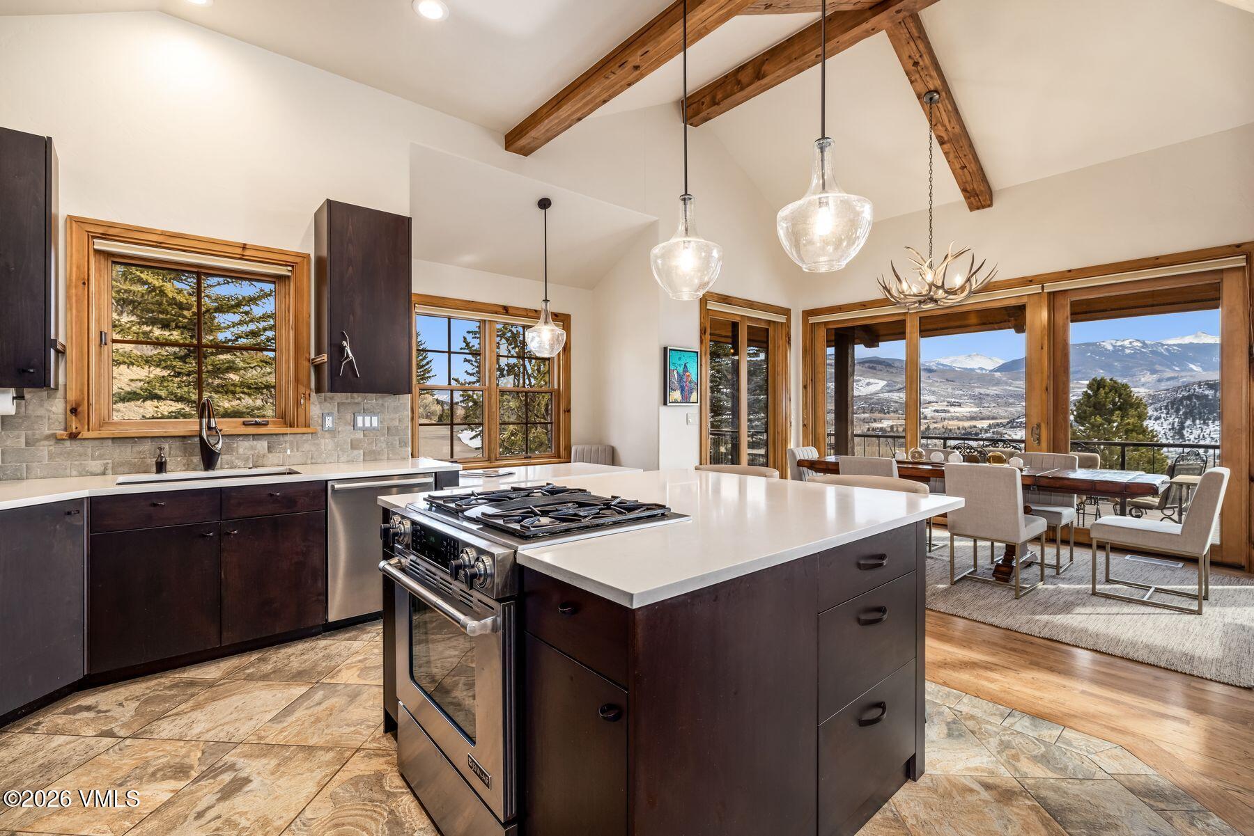 62 Elk Run Edwards, CO 81632 - Photo 21 of 43 a kitchen with a stove a sink and a refrigerator
