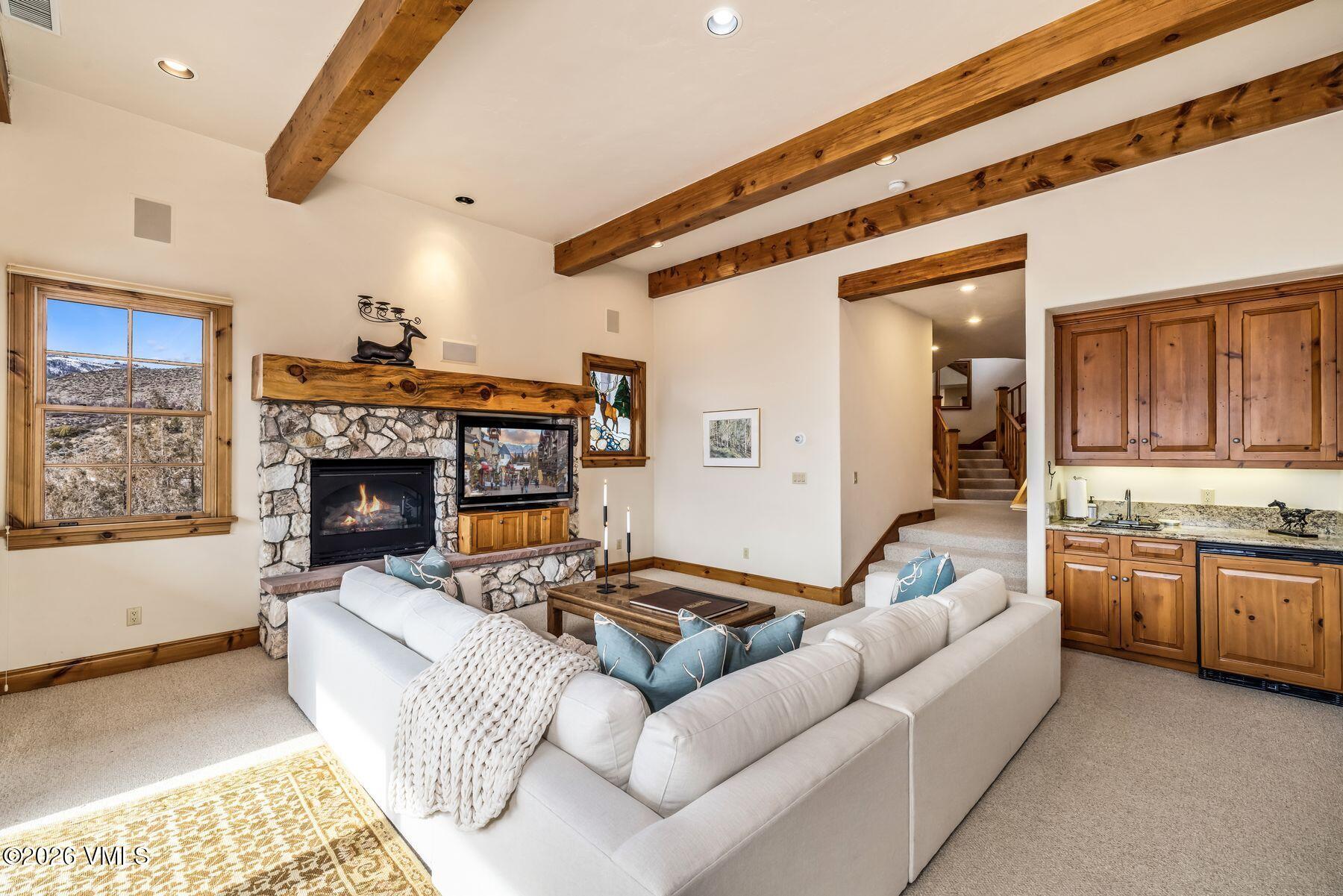 62 Elk Run Edwards, CO 81632 - Photo 25 of 43 a living room with furniture and a fireplace