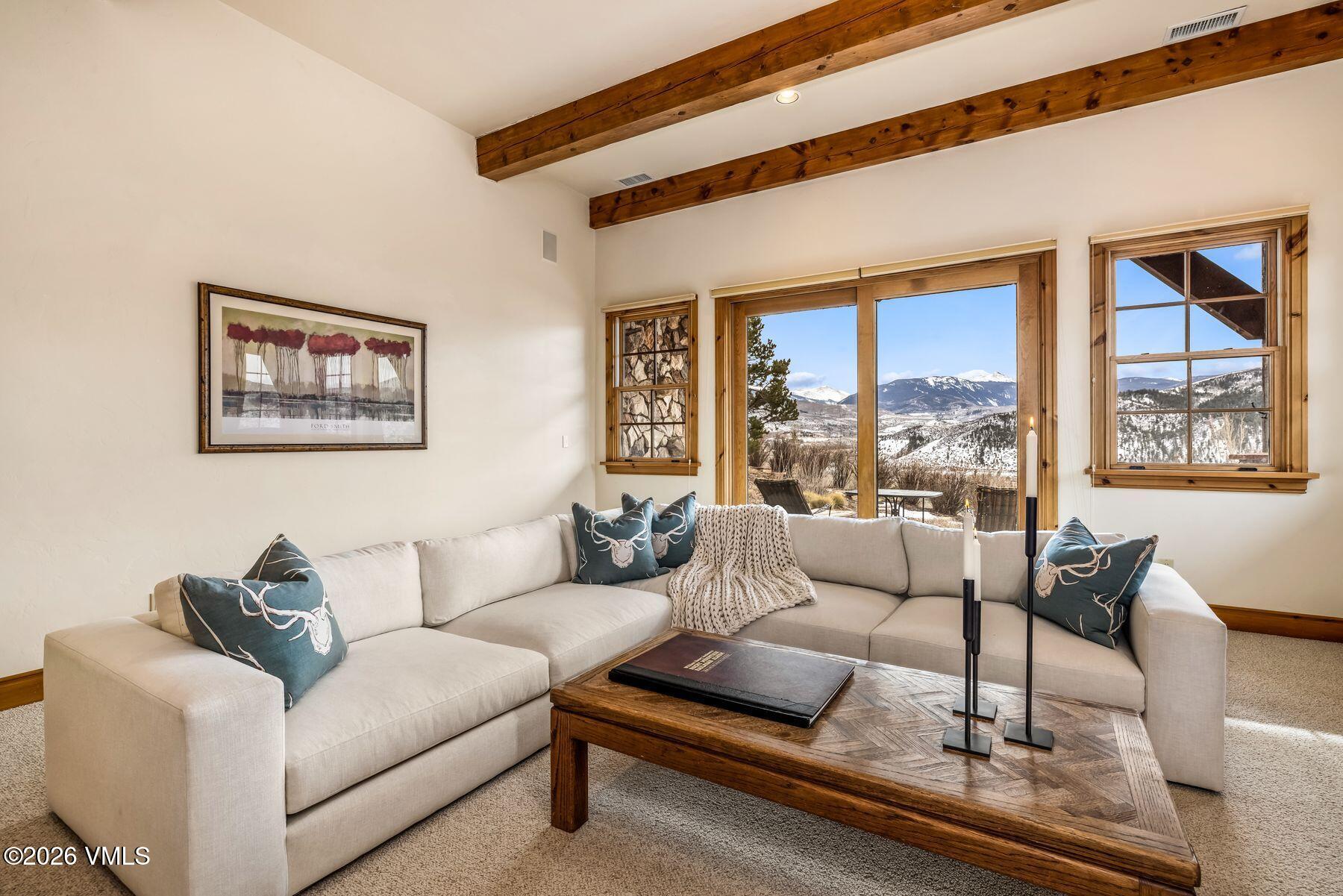 62 Elk Run Edwards, CO 81632 - Photo 26 of 43 a living room with furniture and a large window