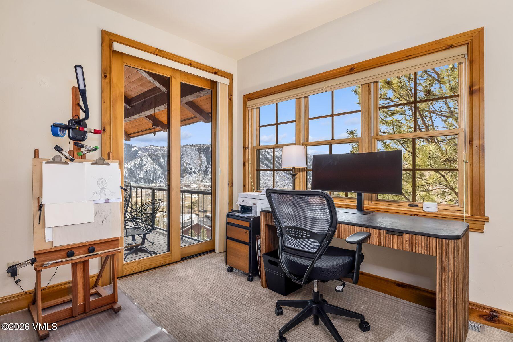 62 Elk Run Edwards, CO 81632 - Photo 36 of 43 a view of a workspace with furniture and a window