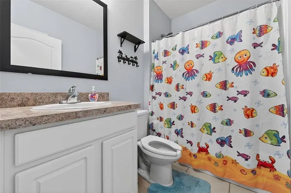 a bathroom with a sink and a toilet