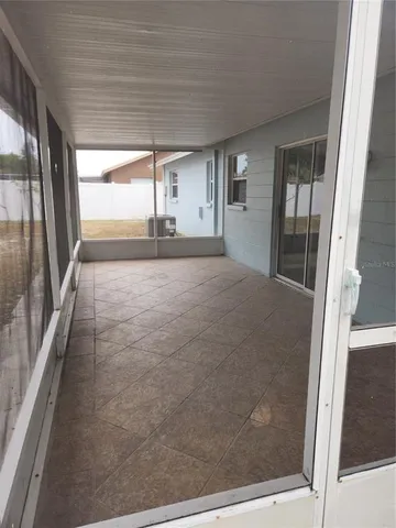 a view of a backyard of the house