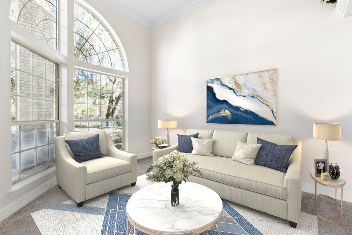 86305 Meadowfield Bluffs Road Yulee, FL 32097 - Photo 12 of 33 a living room with furniture and a large window