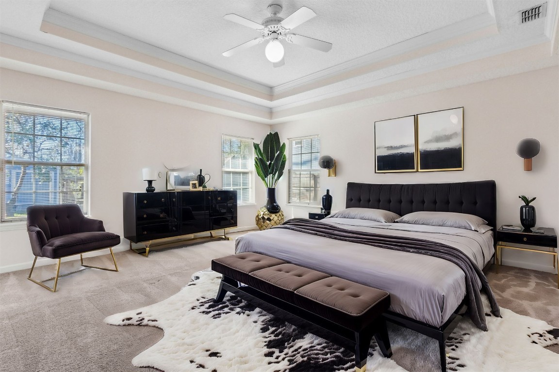 86305 Meadowfield Bluffs Road Yulee, FL 32097 - Photo 23 of 33 a bedroom with a bed and a couch