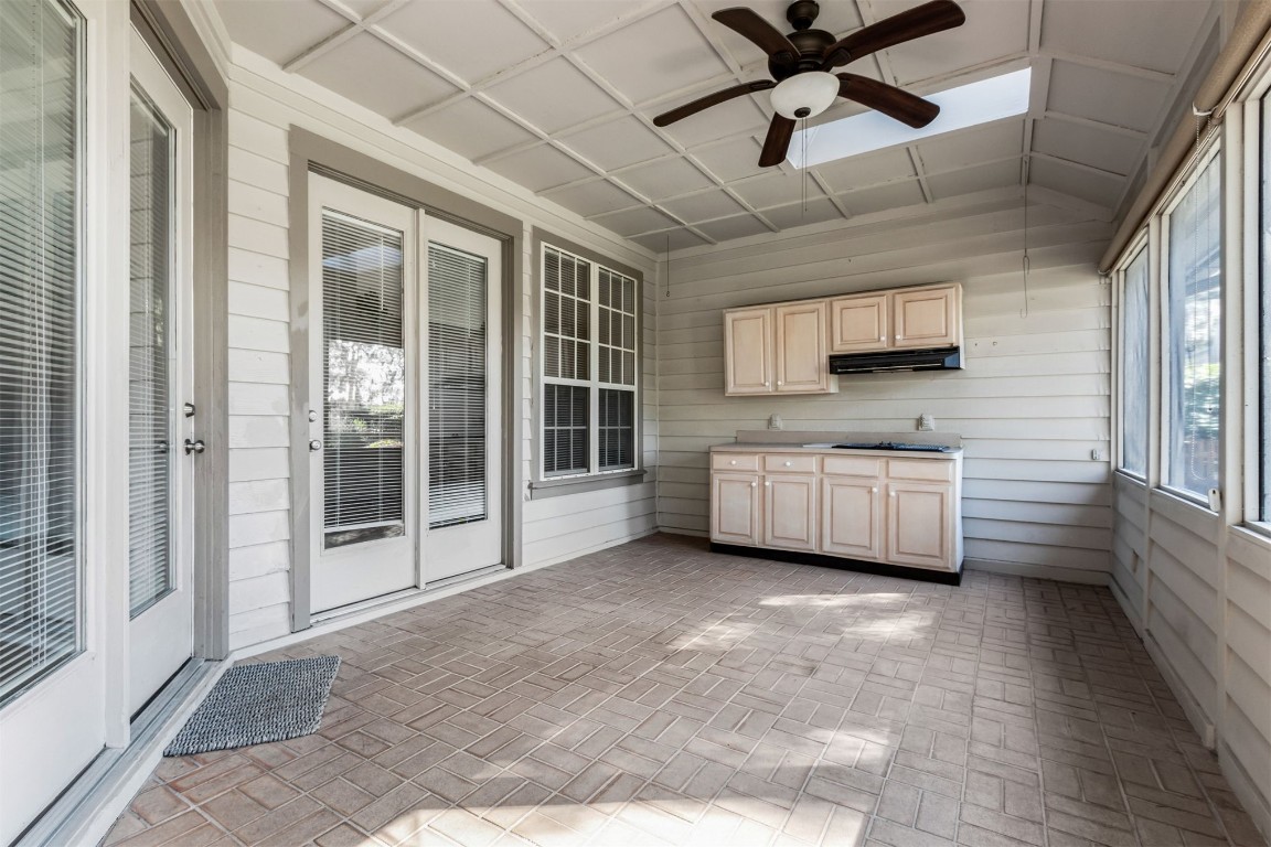 86305 Meadowfield Bluffs Road Yulee, FL 32097 - Photo 29 of 33 a view of a kitchen with stove and cabinets