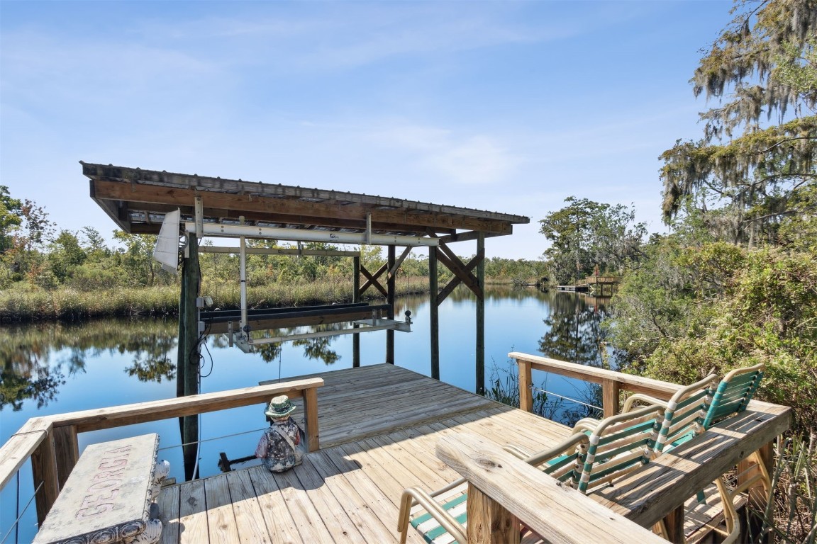 86305 Meadowfield Bluffs Road Yulee, FL 32097 - Photo 5 of 33 a view of a balcony with chairs