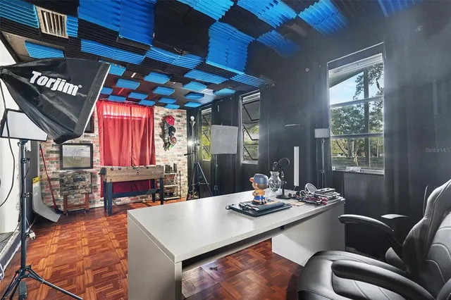 a view of a dining room with furniture window and outside view