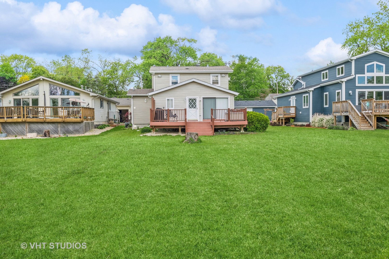 36825 North Lake Street Ingleside, IL 60041 - Photo 14 of 14 a view of a house with a yard and sitting area
