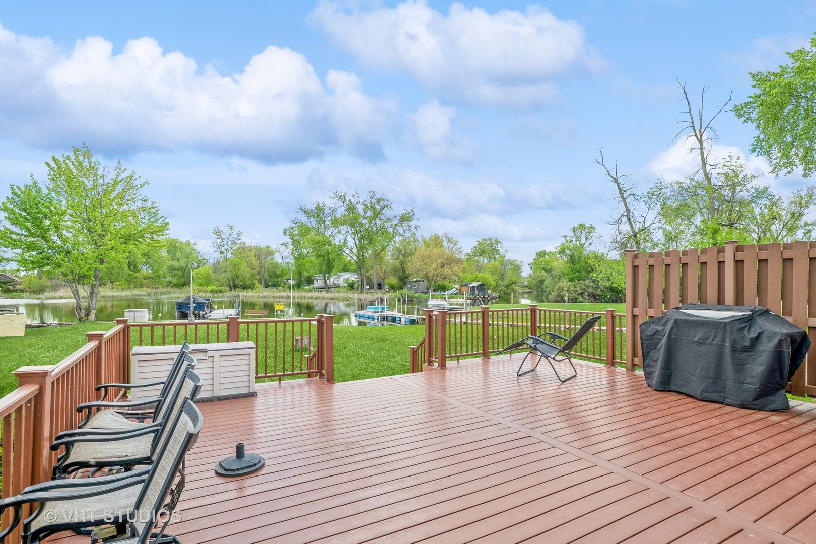 36825 North Lake Street Ingleside, IL 60041 - Photo 9 of 14 a view of deck with two chairs and wooden floor
